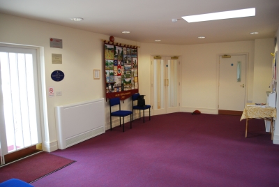 Entrance lobby showing wall hanging and doors to hall and green room