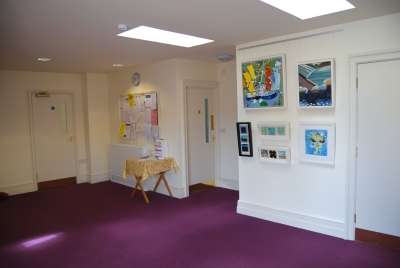 Entrance lobby showing art display and notice board